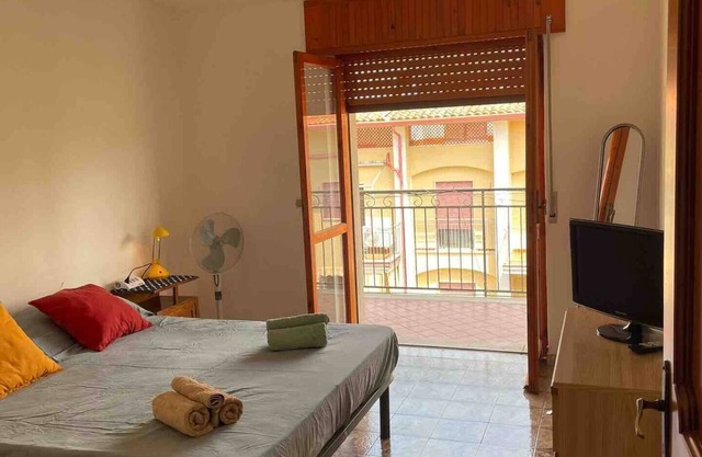 Double Room in Diamante center with balcony and terrace with great view