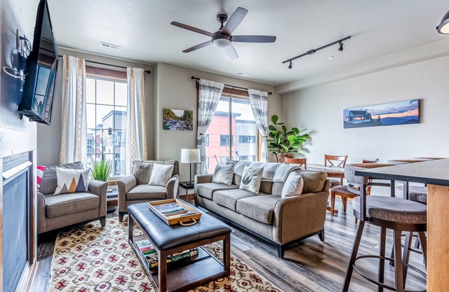 Downtown, mountain-view stay with balcony, fireplace & washer/dryer