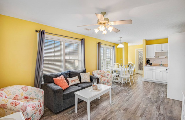 Dreamy ocean-view suite with pool, central AC, full kitchen, patio, & balcony