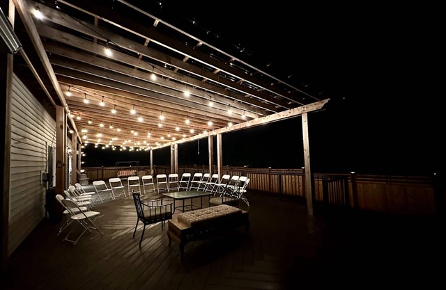 Duplex on acreage with large deck and beautiful outdoor space