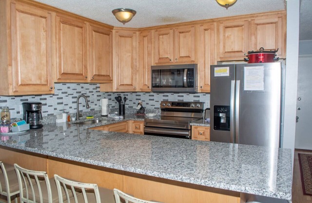 E104 · Winterplace Ski in Ski out condo First floor! E104