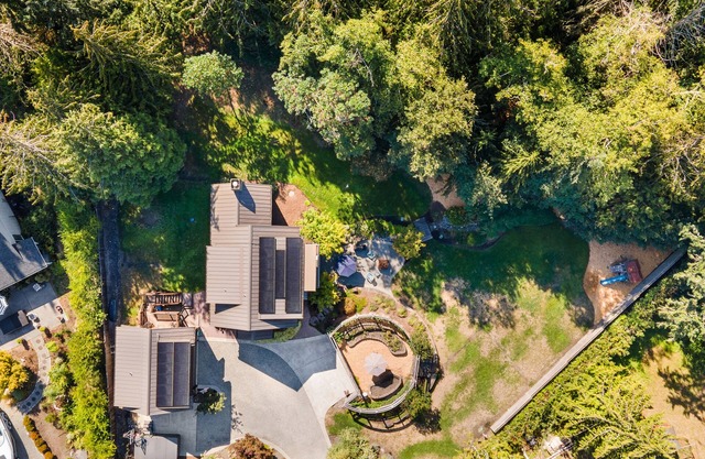 Eco-conscious home with private hot tub, Olympic views, gym, & play structure
