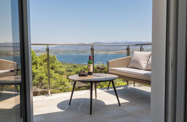 Elegant and Modern Panoramic Penthouse with Dune, Sea and Vineyard Views.