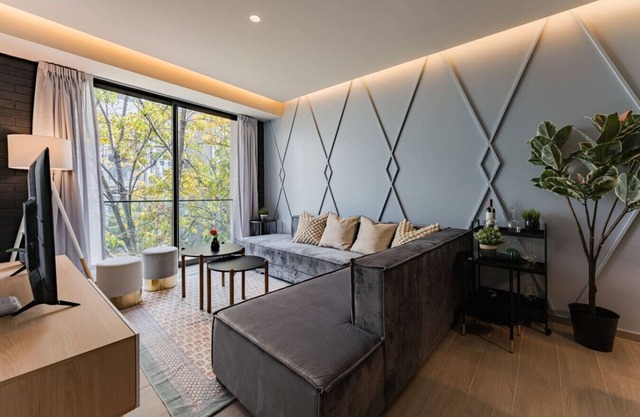 Elegant Apartment with Balcony and City Views