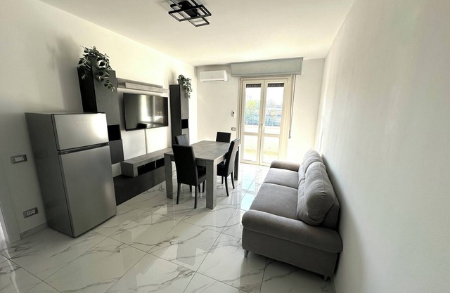 Elegante Wohnung nur einen Steinwurf vom Meer entfernt, Elegante appartamento a due passi dal mare