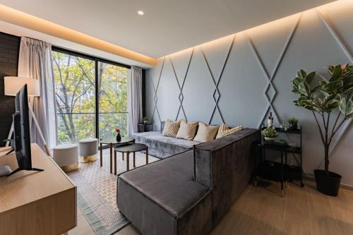 Elegant Apartment with Balcony and City Views