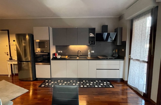 Elegant apartment with private parking, a 5-minute walk from INALPI ARENA
