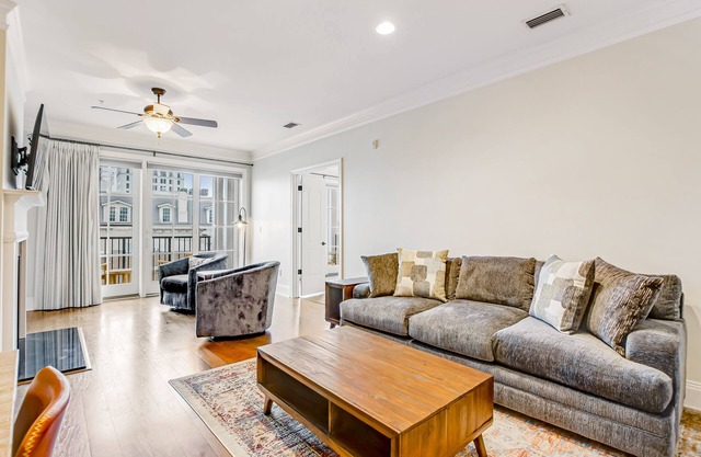 Elegant condo with river & city hall views, balcony & central AC