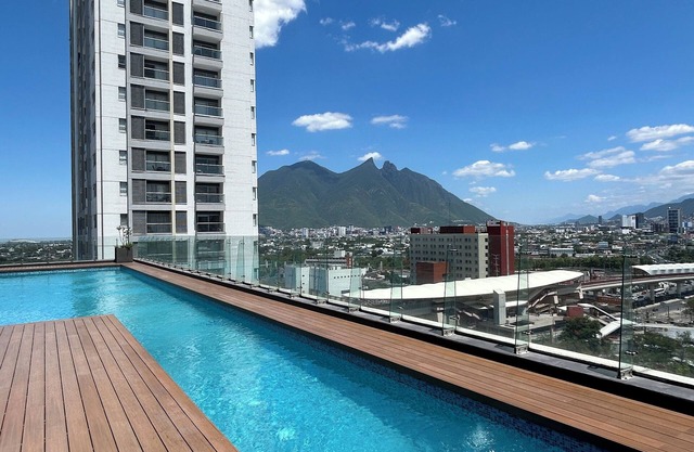 Elegant loft apt Santa Lucia king size bed, swim pool, gym, parking, kids club