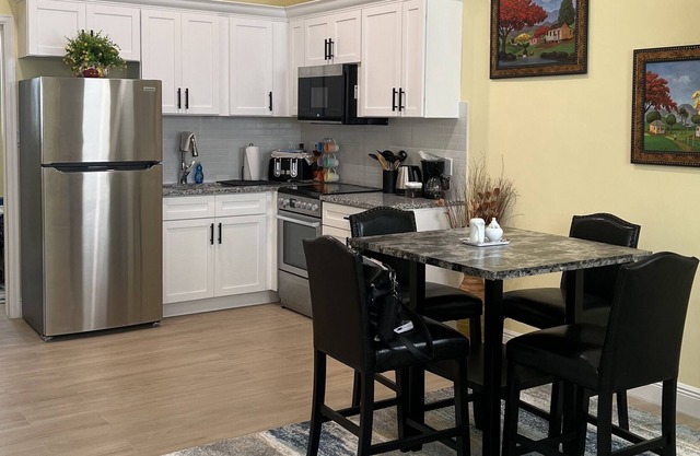 Elegant, pristine, secure, 1 bedroom 1.5 bath, near the beach and supermarket.