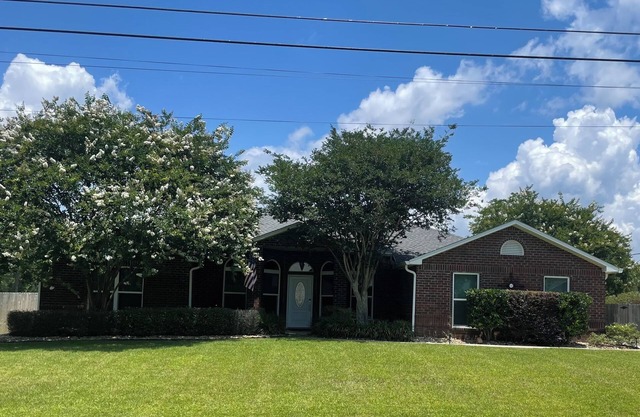 Elegant single level with 4 BR 3 BA, private oasis featuring a heated salt pool