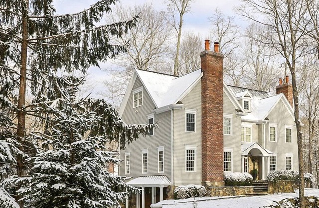 Elegant, spacious escape nestled in the trees with home theater, huge gym
