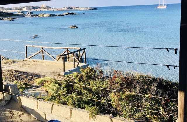 Elegant Villa WI-FI FREE with terrace overlooking the sea almost touching the water.