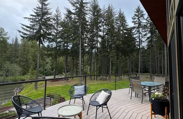 Enchanted River A-Frame, a secluded retreat with game room, hot tub & yard games