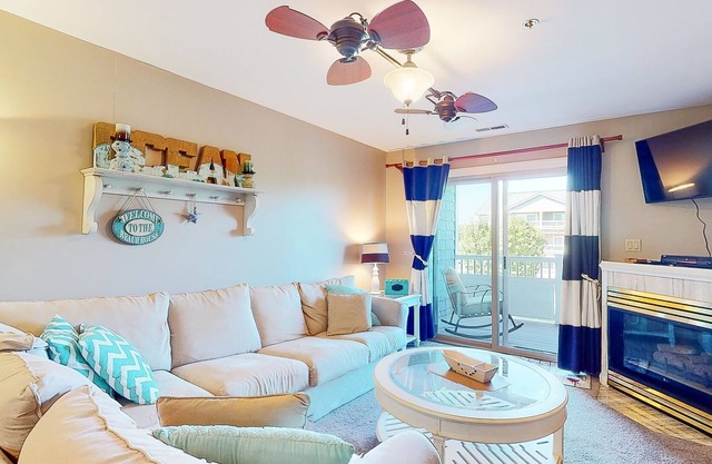 Enchanting condo with pool, fireplace, central AC, & washer/dryer