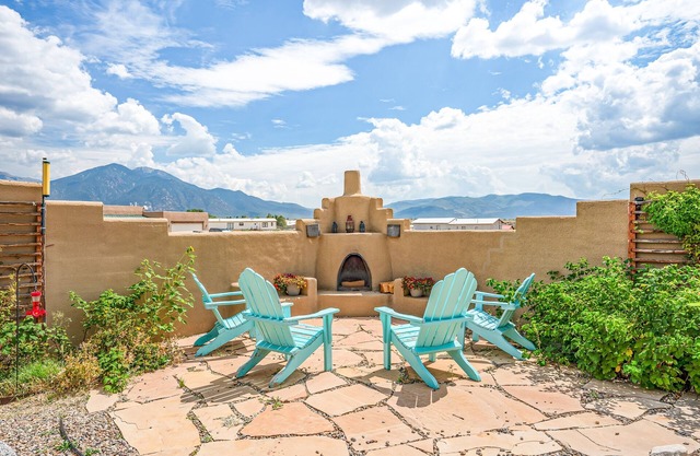 Enchanting dog-friendly home with firepit, patio, gas grill, & jetted tub