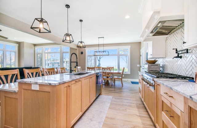Enchanting lakefront home with pool, hot tub, firepit, game room, & washer/dryer