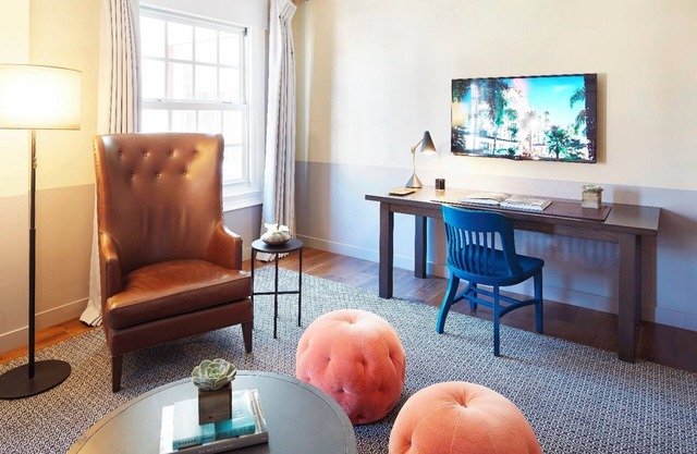 Enjoy a Dip in Our Relaxing Pool Area after a Day Exploring Hollywood's Heart