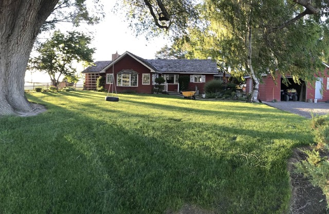 Enjoy peace and quiet on this family farm just minutes from Twin Falls