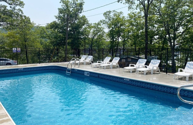 Enjoy the Quiet Side of the Lake With Resort Amenities + Pool.