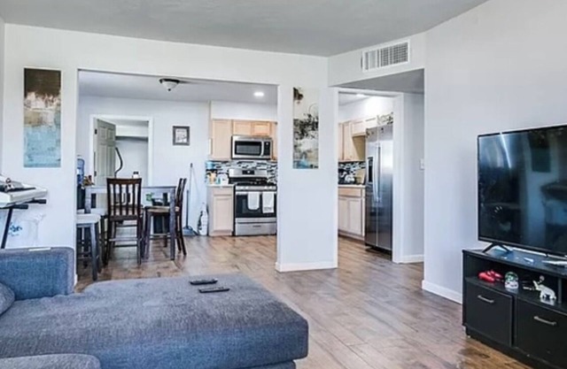 Enjoy this beautiful wood floor and more!