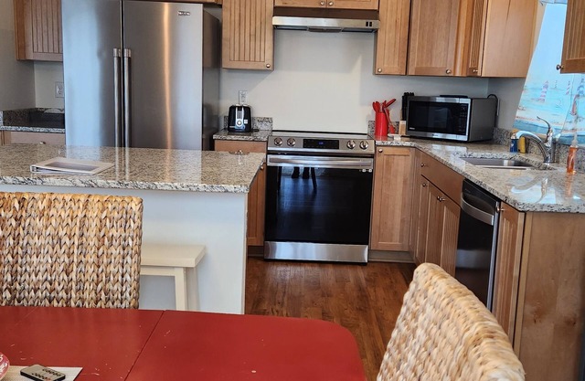 Enjoy your next vacation by the sea in this bright and inviting home.