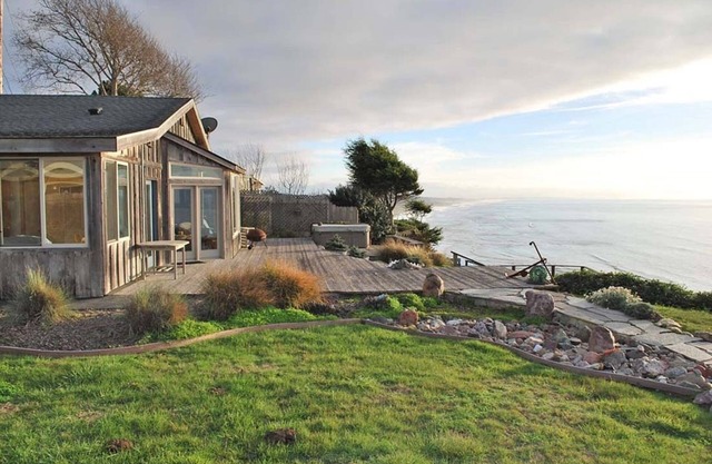 Enter the "Garage House" and step into sublime ocean front living.