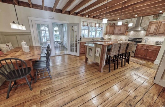 Entertain in this 4 bedroom farmhouse with hot tub