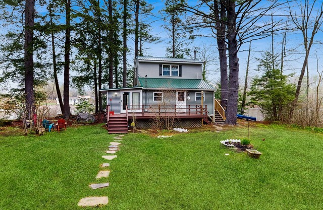 Entire lakefront duplex on Togus Pond with decks, canoe, firepit & great view