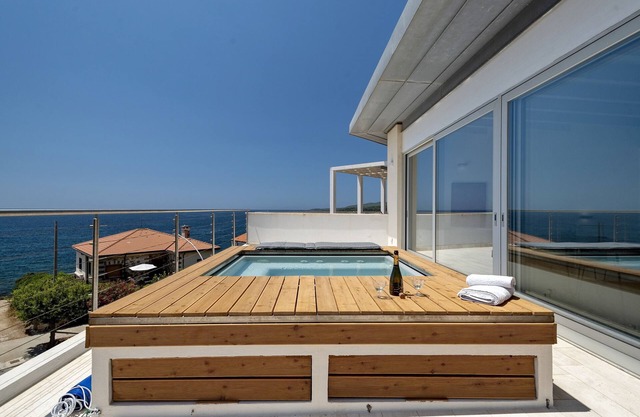 STUNNING SEAFRONT VILLA IN FERTILIA 10 guests