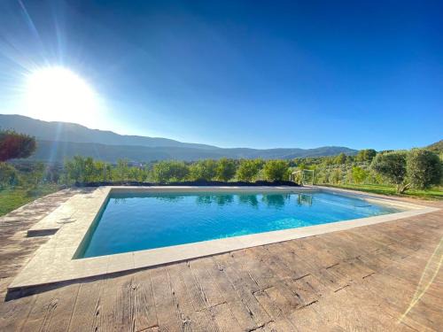 ENTRESIERRAS Apartamentos rurales piscina 24h con barbacoa y espacio para eventos