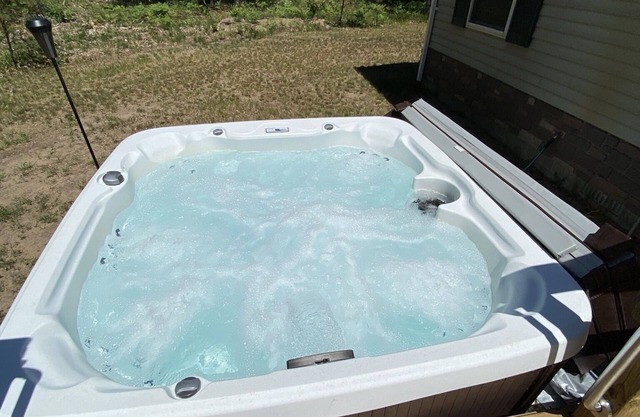 Escape to Northern Michigan! Private, secluded with spa. ORV/snowmobile trail.