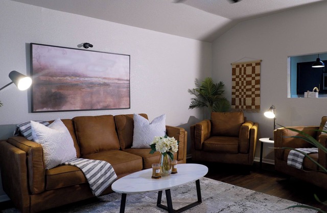 Escape to our cozy Black House retreat, just minutes from Fort Carvazos!