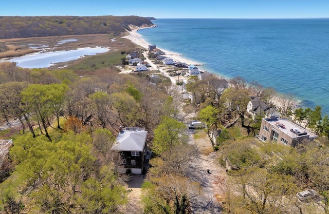 Escape to Paradise: Steps to Beach & Spacious Deck