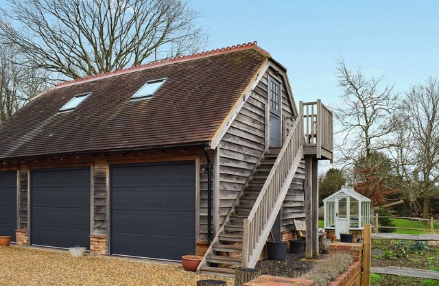 Escape to this enchanting studio apartment set above a barn.