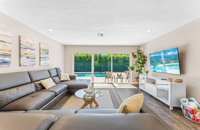 Escape to a modern 3 Bedroom retreat just minutes away from the most amazing beach in South Florida