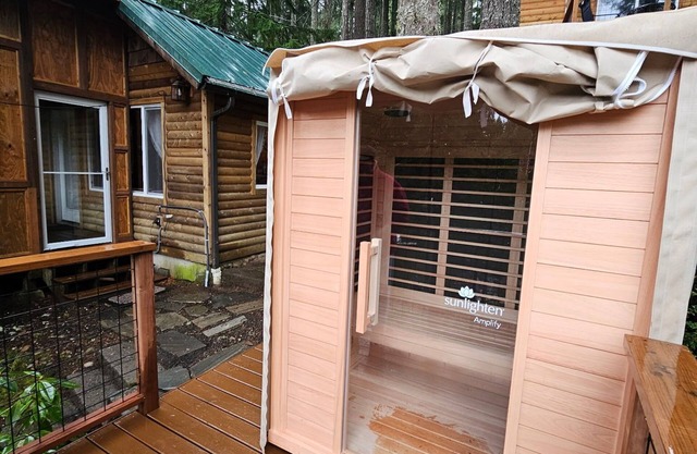 Escape Outdoor Infrared Sauna Sunroom Game room Lakefront cabin Fireplace