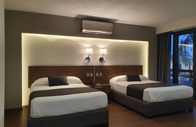 Estanza Hotel & Suites