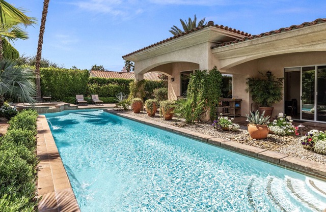 Exceptional Spanish-style home w/private sparkling pool, spa, & mountain view