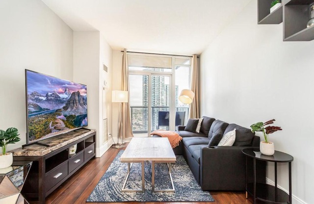 Executive 2BR 2BATH Condo with Lakeview Steps from SQ1