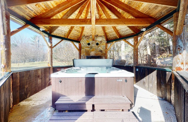 Expansive home with game room, hot tub, firepit, & fireplace - walk to town