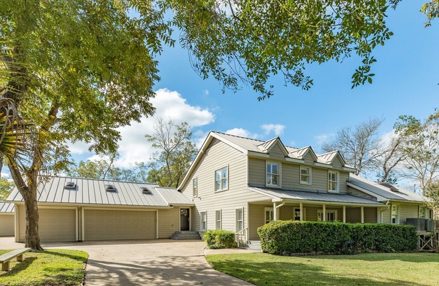 Expansive home on the water w/ a dock, large deck, shared pool, & central AC!