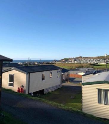 Experience Coastal Bliss in Our Modern 2019 Sea Viev 2 Bedroom static caravan at Clarach Bay Holiday Village!