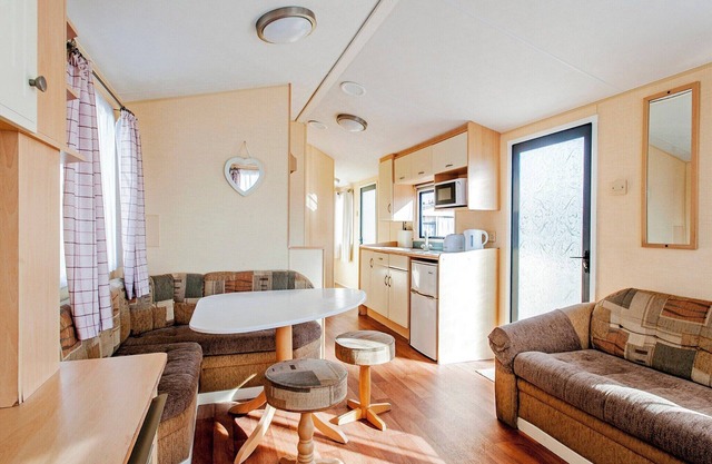 Experience comfort and relaxation in our charming caravan, perfect for your next getaway.
