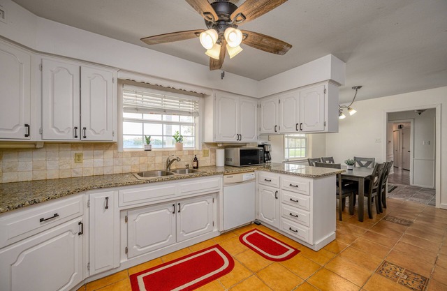 Experience the farmhouse on a ranch with a Lake view