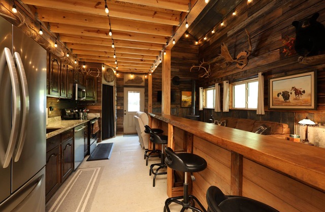 Experience the serene beauty of Campton, KY in the cozy 2-bedroom, 1-bathroom Wolf Pen cabin