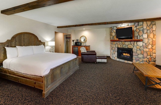 Experience Warm Home Runs with Rustic Elegance at a Riverside Property
