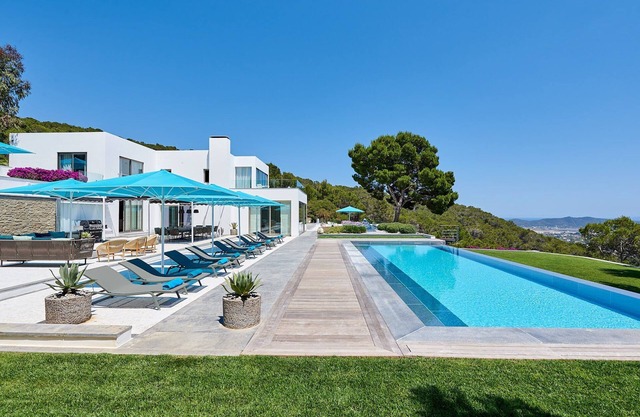 Exquisite Ibiza Villa | Villa Moody | 6 Bedrooms | Spacious Furnished Sun Terrace | Private Outdoor Infinity Pool | BBQ Facilities | Shaded Outdoor Dining Area | Private Garden | Fitness Room | Sant Josep de sa Talaia