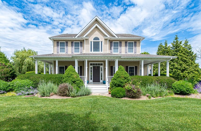 Exquisite dog-friendly home with large yard, furnished porch, & firepit