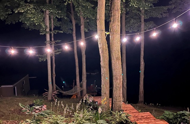 Family friendly cottage on Buck Lake with sandy beach and amazing sunsets!